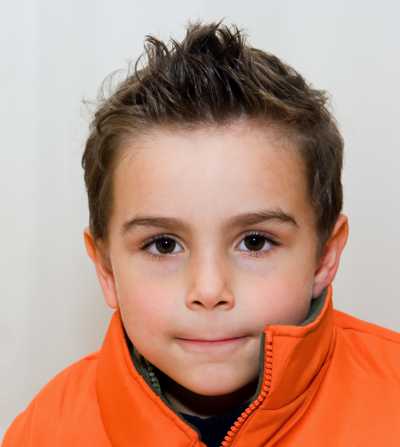 Boy's short spiked haircut