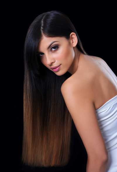Sleek long dark hair with warm brown ends