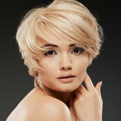 Short blonde hair with soft feathered layers
