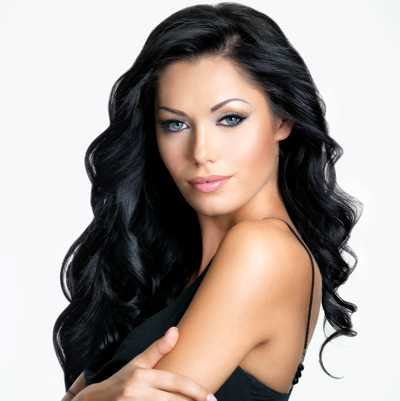 Long black hair styled in loose curls