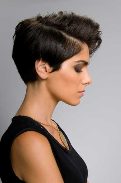 Short dark pixie cut with a textured side swept top